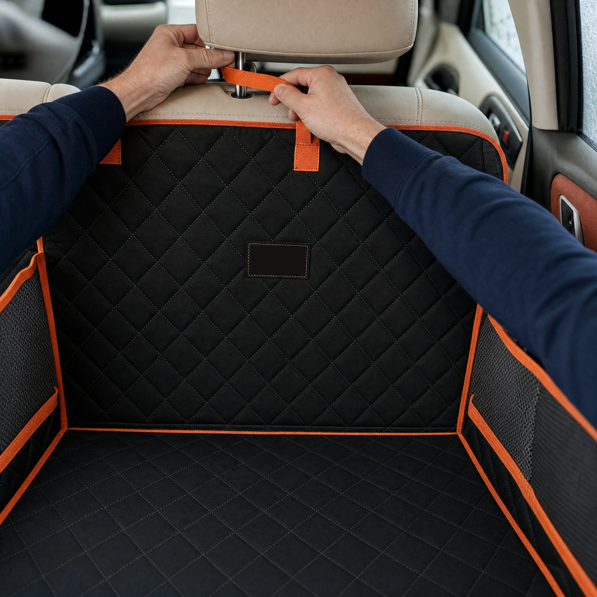 Hands looping the strap around a rear headrest