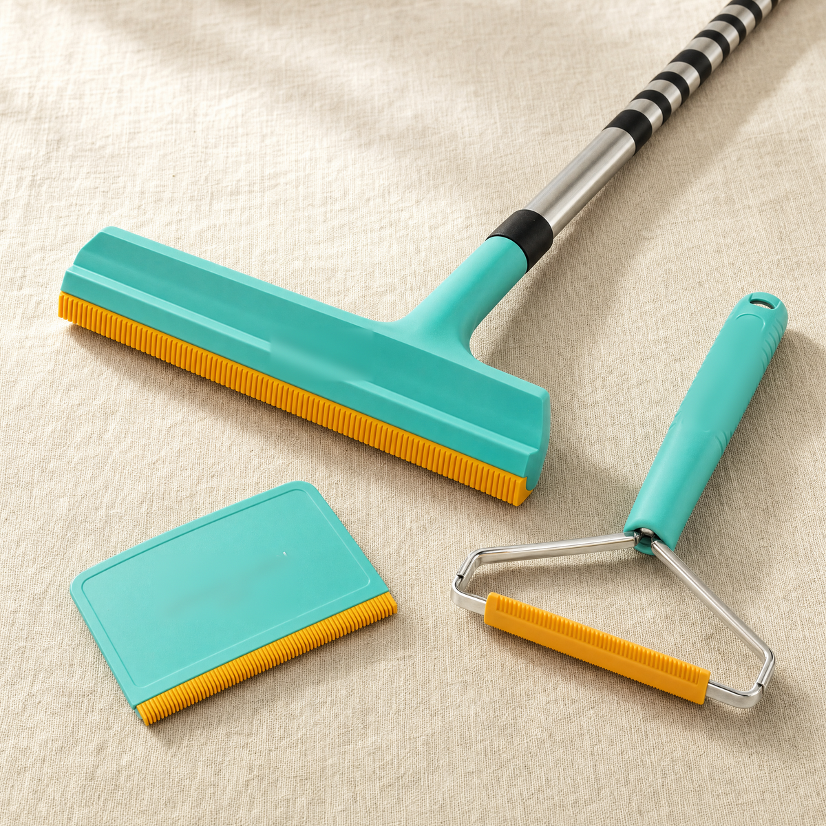 Three pet hair removal tools
